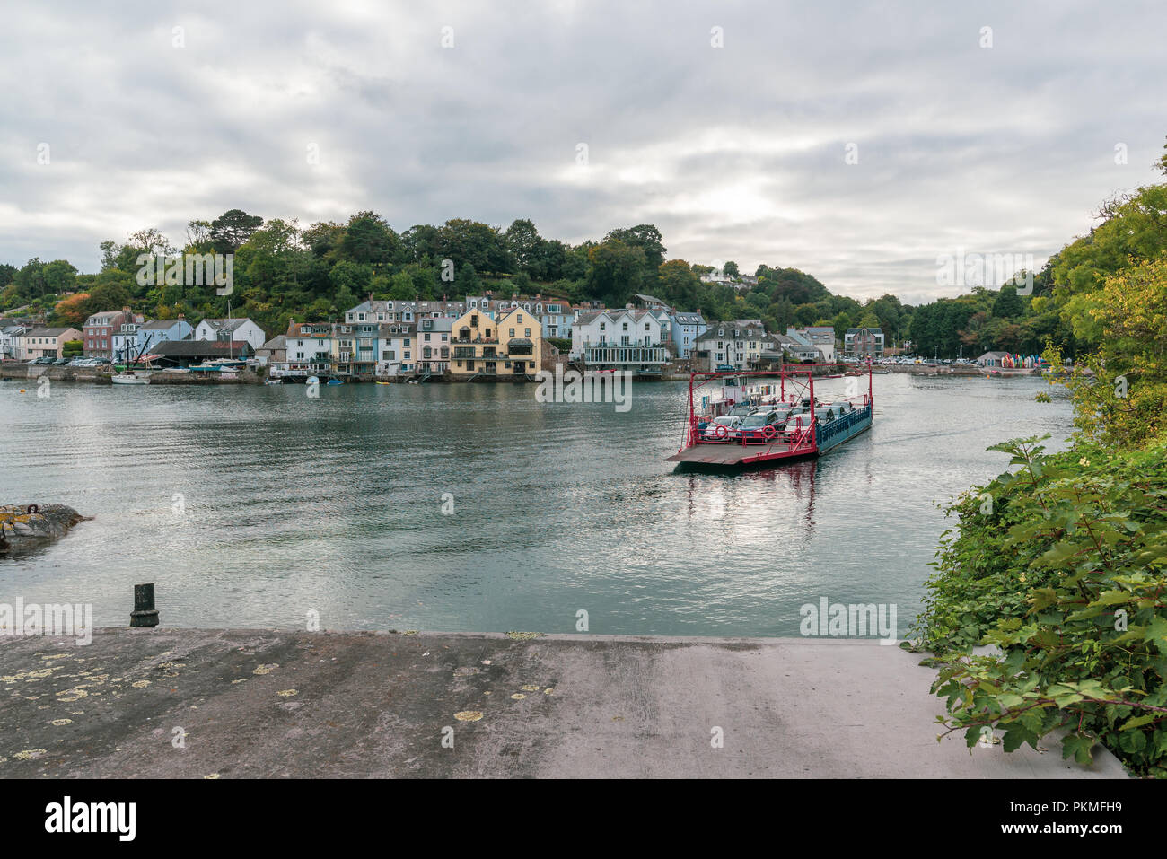 A ferry transports cars and people across the River Fowey from Fowey to Bodinnick, Cornwall, England, UK Stock Photo