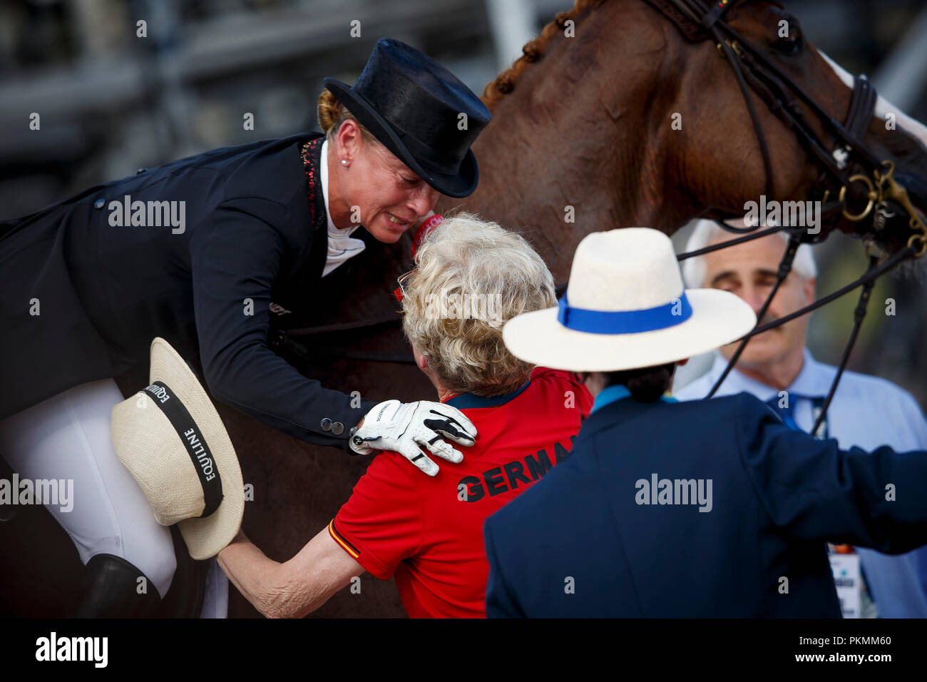 Tryon, USA. 13th Sep, 2018. Equestrian, FEI World Equestrian Game 2018, Grand Prix de Dressage: Isabell Werth (L) cheering while on her horse Bella Rose. Credit: Sharon Vandeput/Sportfoto-Lafrentz/dpa/Alamy Live News Stock Photo