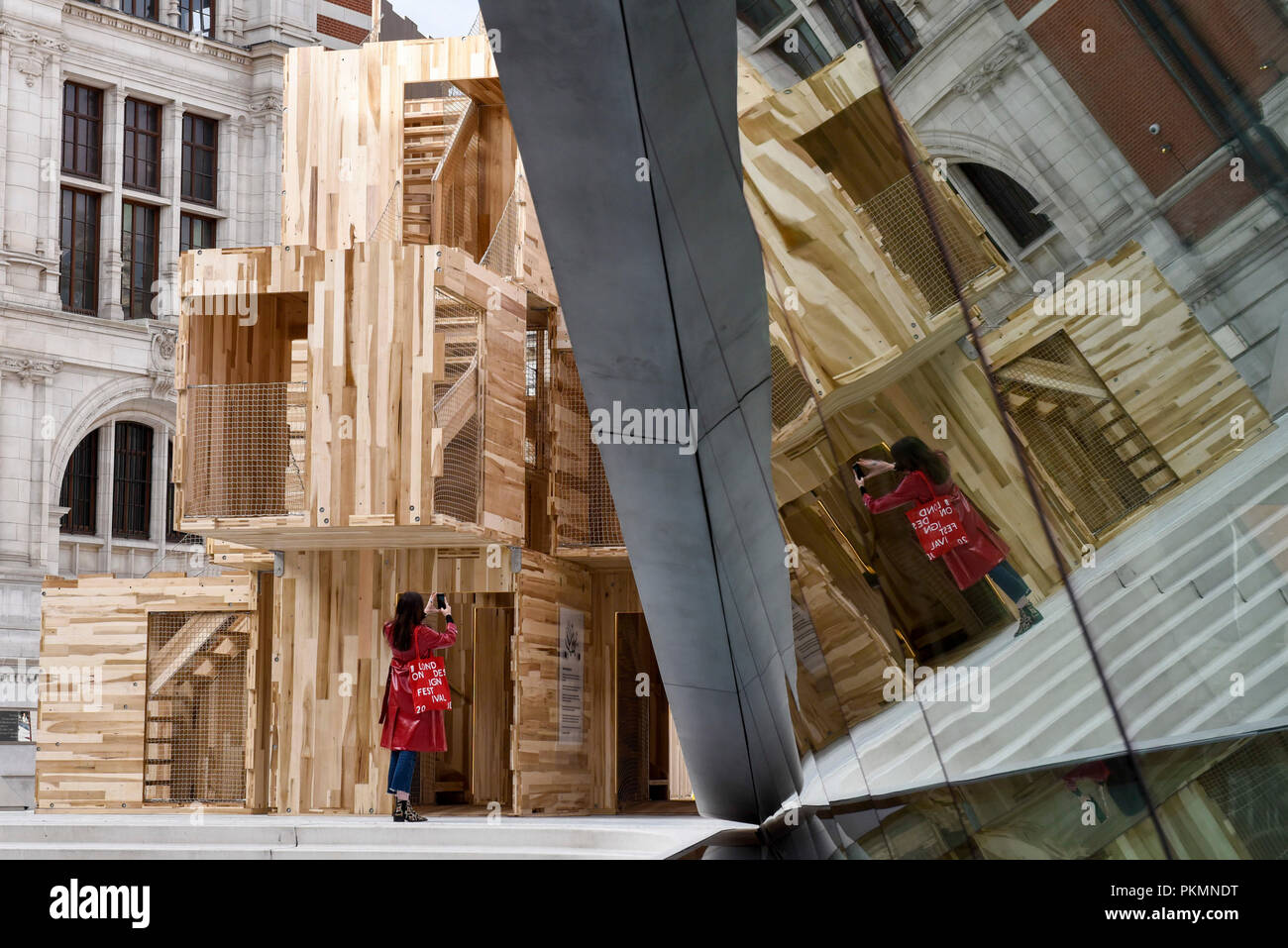 London, UK. 14 September 2018. "Multiply" by Waugh Thistleton Associates reflected in the Sackler Courtyard at the V&A museum as part of London Design Festival. The festival, now in its 16th year, includes installations across the capital and runs 15 to 23 September 2018. Credit: Stephen Chung / Alamy Live News Stock Photo