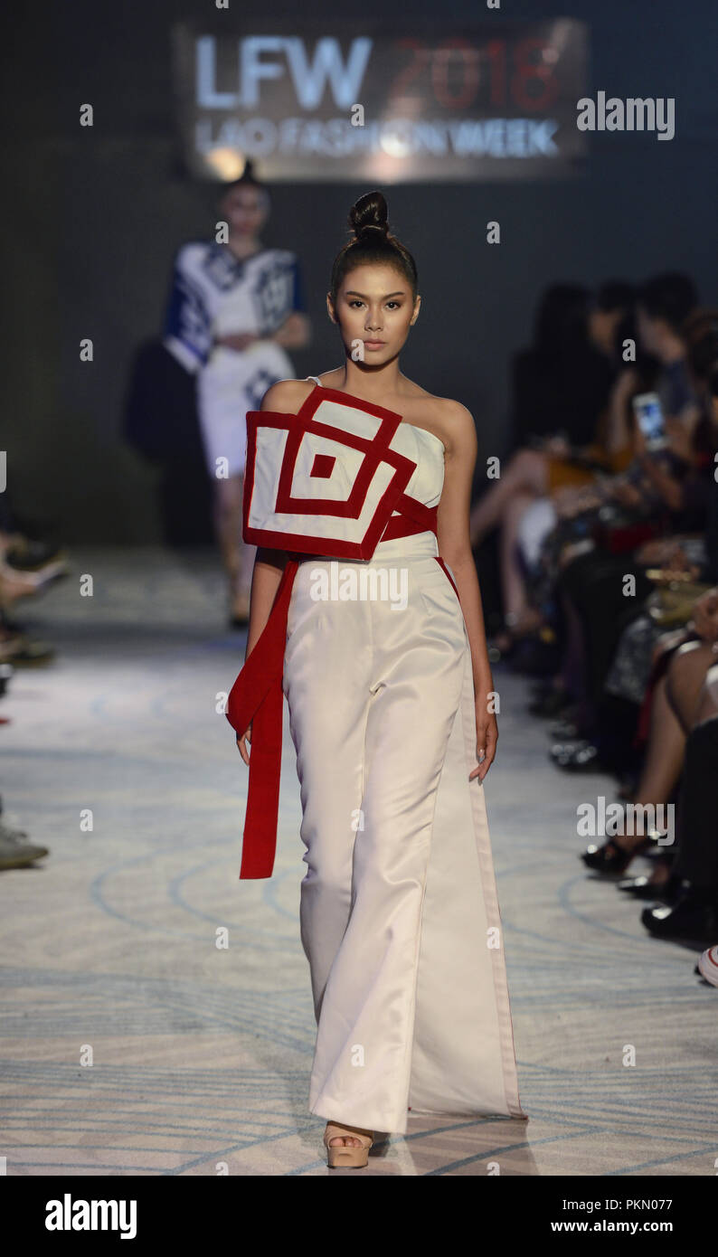 Vientiane, Laos. 14th Sep, 2018. A model presents a creation during the Lao  Fashion Week 2018 in Vientiane, capital of Laos, on Sept. 14, 2018. The Lao  Fashion Week 2018 was held
