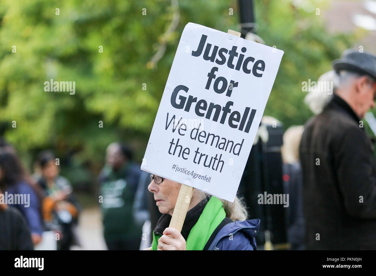 London, UK. 14th Sept, 2018. Monthly silent walk to mark the anniversary of the Grenfell Tower fire that took place 15 months ago. Penelope Barritt/Alamy Live News Stock Photo