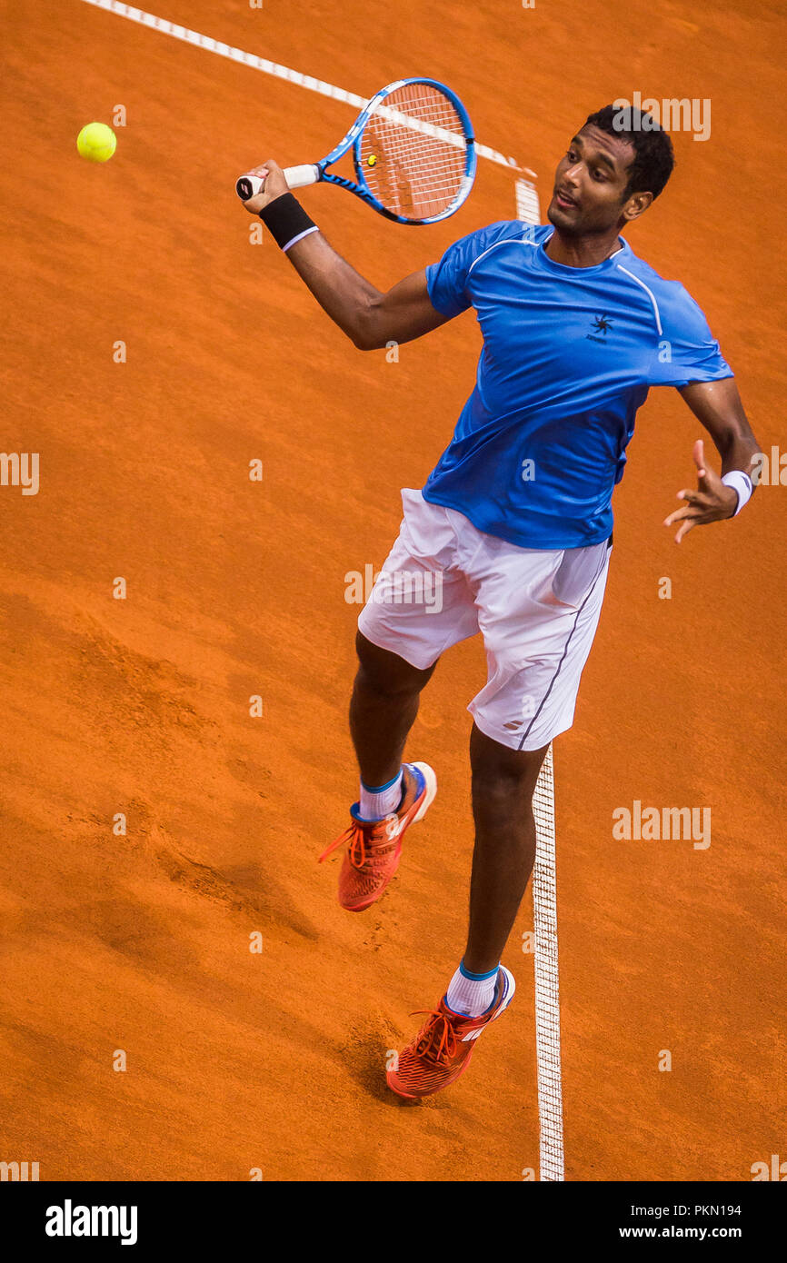Kraljevo, Serbia. 14th September 2018, Kraljevo Sports Venue, Kraljevo, Serbia; Tennis Davis Cup World Group, Play-off, Serbia versus India; Ramkumar Ramanathan (IND) returns Credit: Nikola Krstic/Alamy Live News Stock Photo