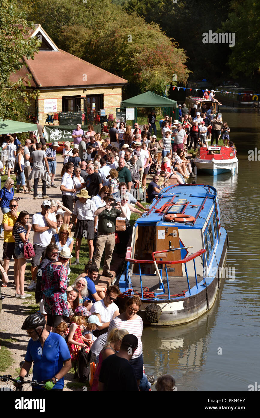 People enjoying a Sunday afternoon out by the Basingstoke Canal, Odiham, Hampshire, UK. 2 September 2018. Stock Photo