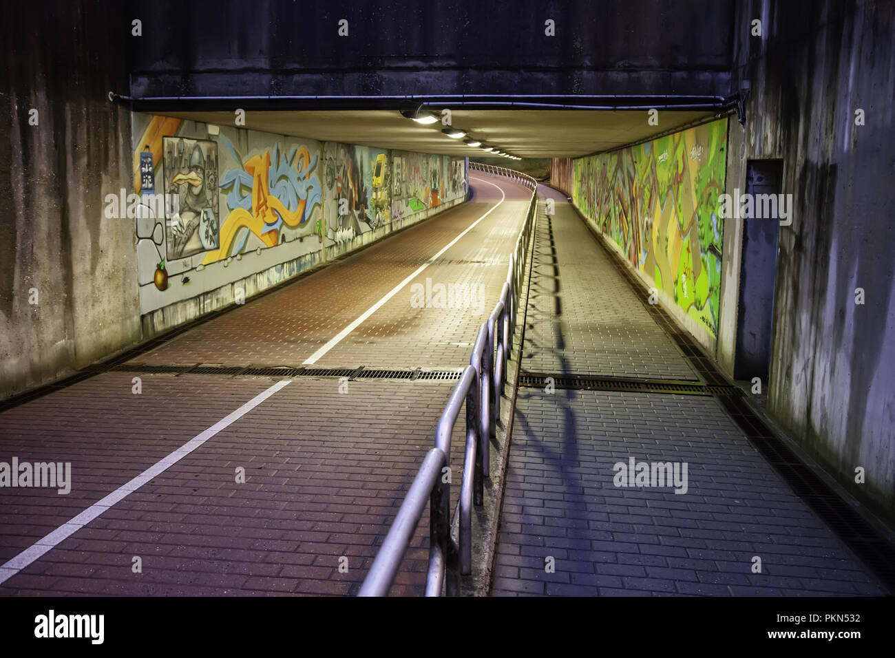 Tunnel with graffiti in bruges, detail of painting and decoration Stock Photo
