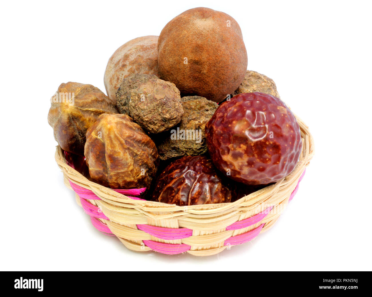 Combinations of herbal medicinal fruits in bamboo basket have property medicine. Stock Photo