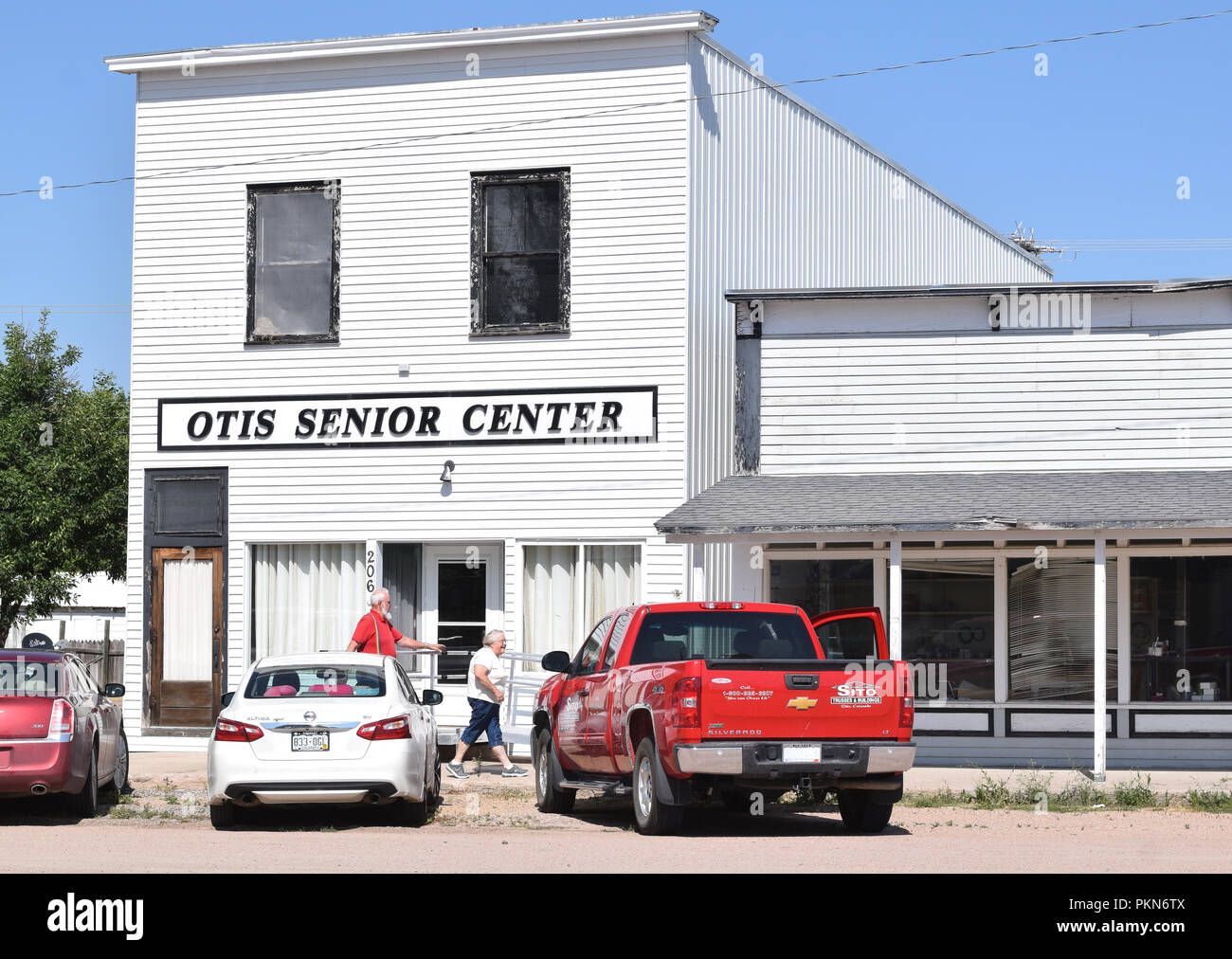 seniors walking in front of the senior center in Otis Colorado Stock
