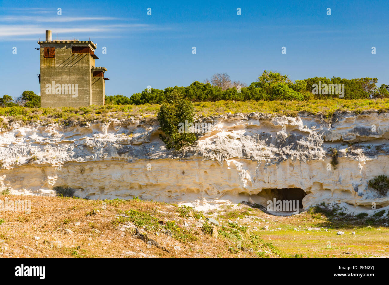 A guard tower and hard labour quarry on Robben Island (Robbeneiland), South Africa, the prison of Nelson Mandela Stock Photo