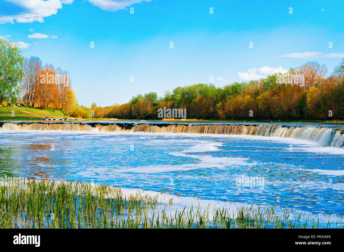Landscape with Ventas Rumba waterfall of Kuldiga in Kurzeme in Western Latvia. The city used to be called Goldingen. Stock Photo