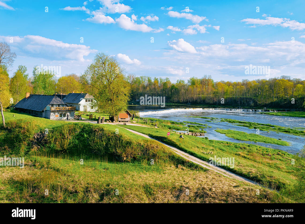 Landscape with Ventas Rumba waterfall at Kuldiga in Kurzeme in Western Latvia. The city used to be called Goldingen. Stock Photo