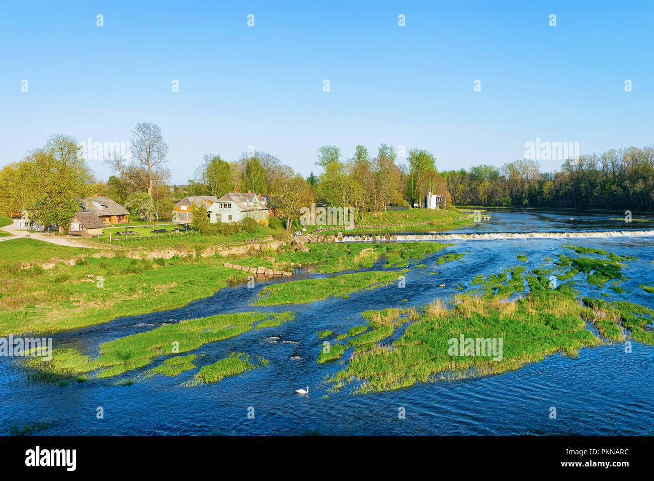 Landscape with Ventas Rumba waterfall in Kuldiga in Kurzeme in Western Latvia. The city used to be called Goldingen. Stock Photo