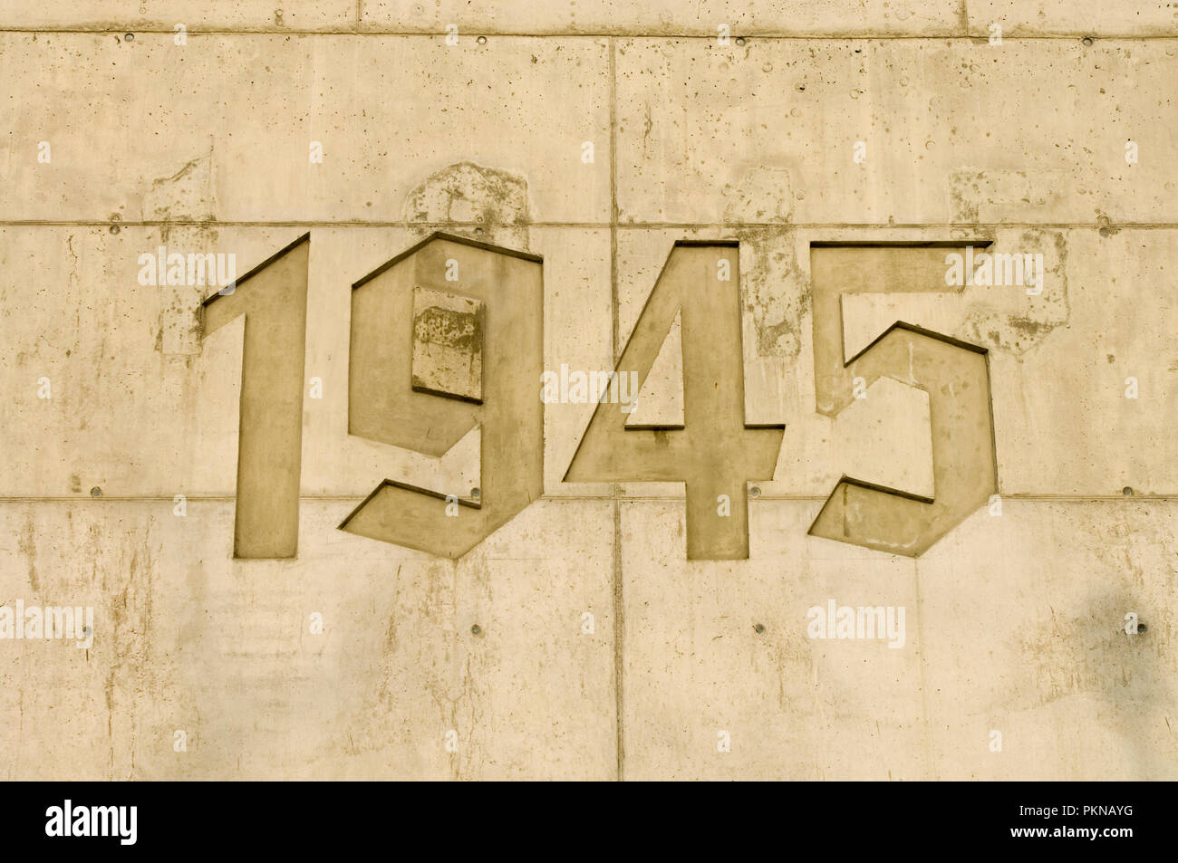 1945 carved into the wall of the Holocaust memorial at Radegast railway station museum in Lodz, Poland. During the Second World War 200000 Jews were s Stock Photo