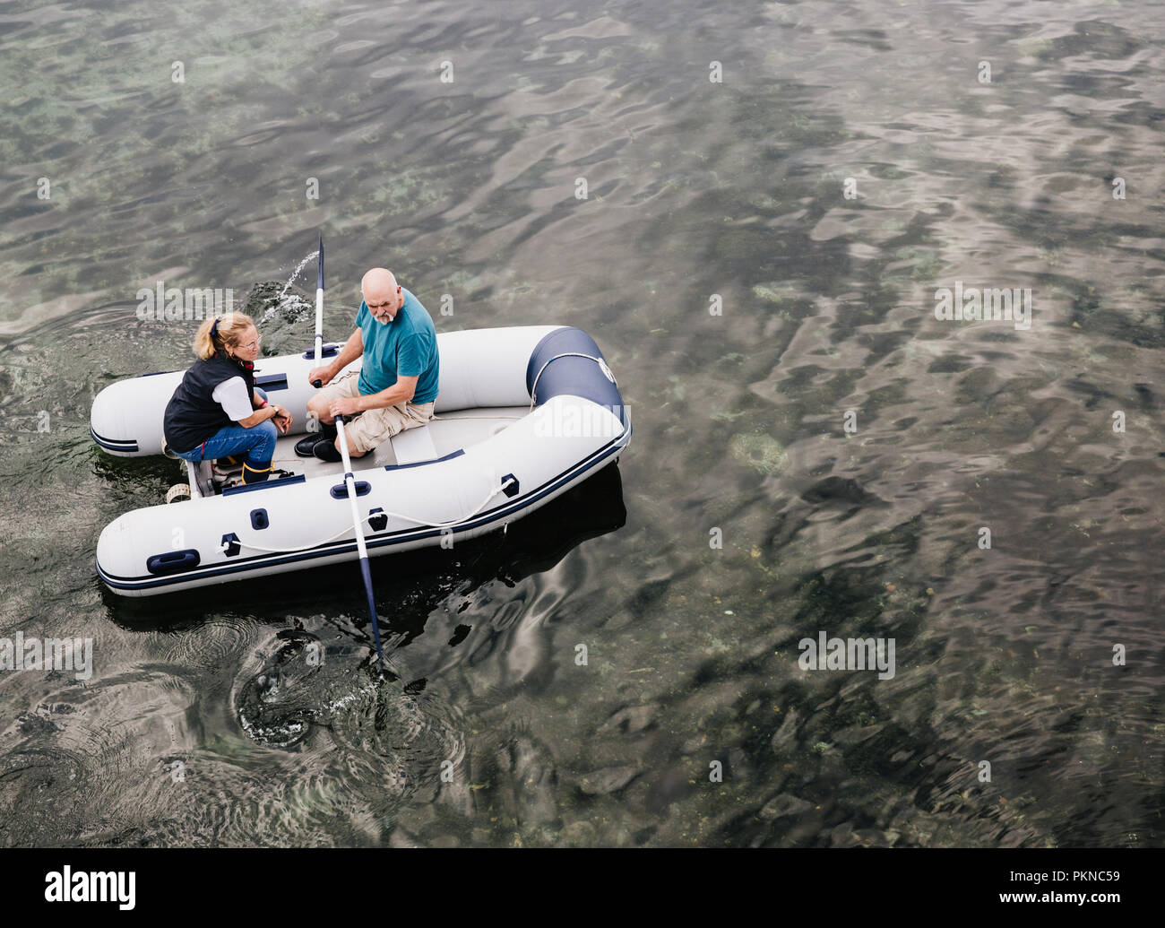 Dinghy sailing couple hires stock photography and images Alamy