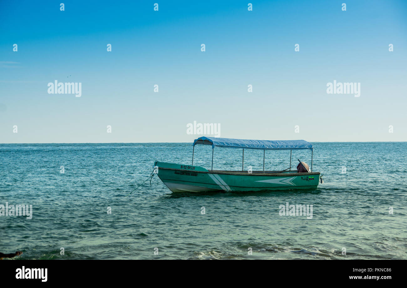 MANABI, ECUADOR, MAY, 29, 2018 Outdoor view of fishing boat in the ocean during a gorgeous sunny day in the beach of Cojimies Stock Photo
