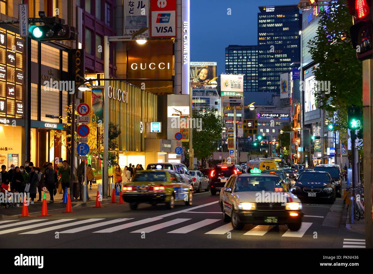 TOKYO, JAPAN - NOVEMBER 30, 2016: Neon lights of Shinjuku district of Tokyo, Japan. Tokyo is the capital city of Japan. 37.8 million people live in it Stock Photo
