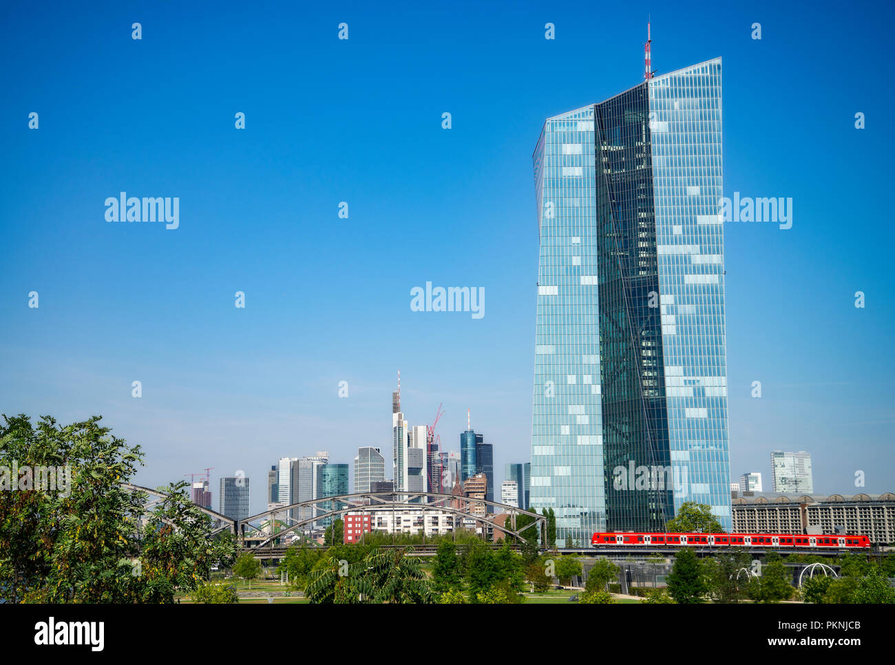 The European Central Bank (ECB) with the skyline of Frankfurt in the background Stock Photo