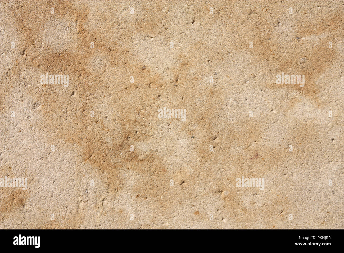 Grunge sandstone background texture. Old stained wall. Stock Photo