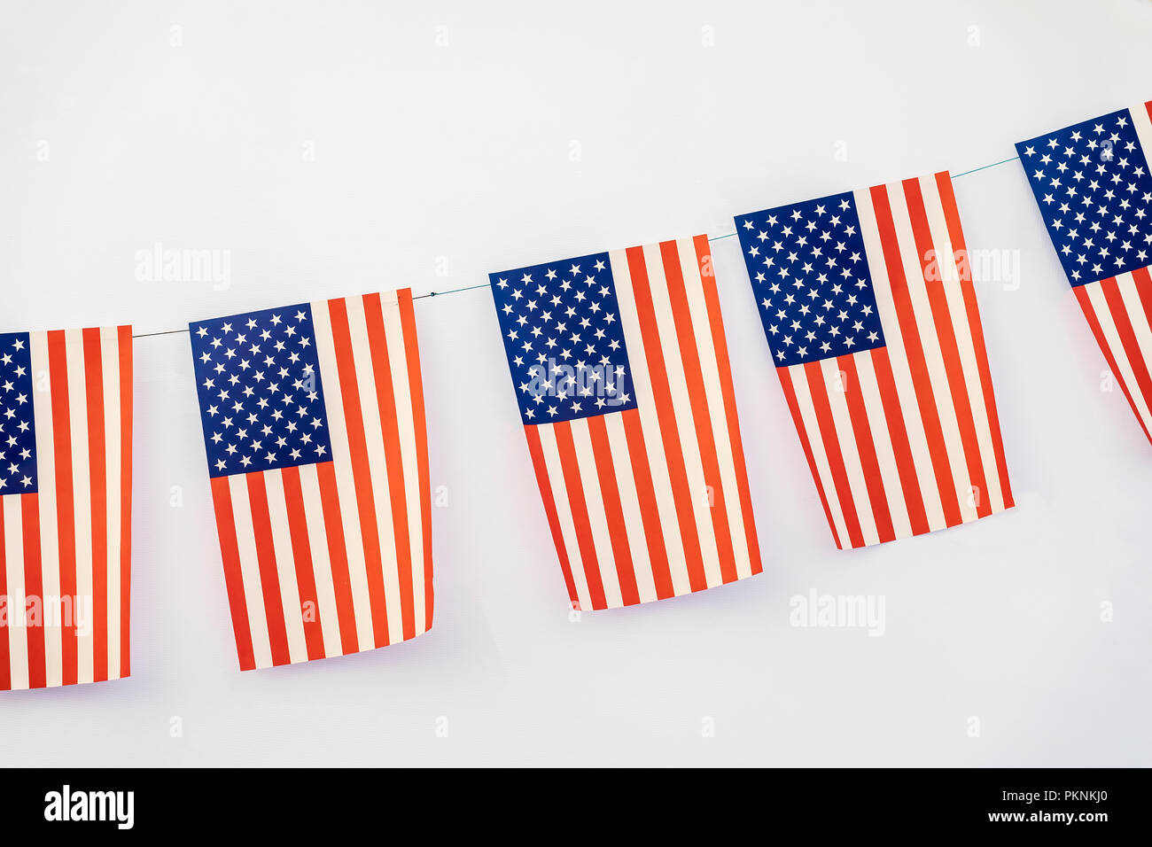Garland Of American Flags Of Rectangular Shape On Light Background