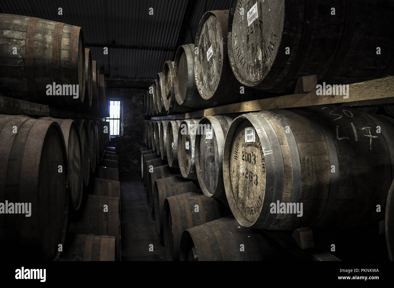 Oak Barrels of Whisky in Warehouse, Islay, Scotland, UK Stock Photo