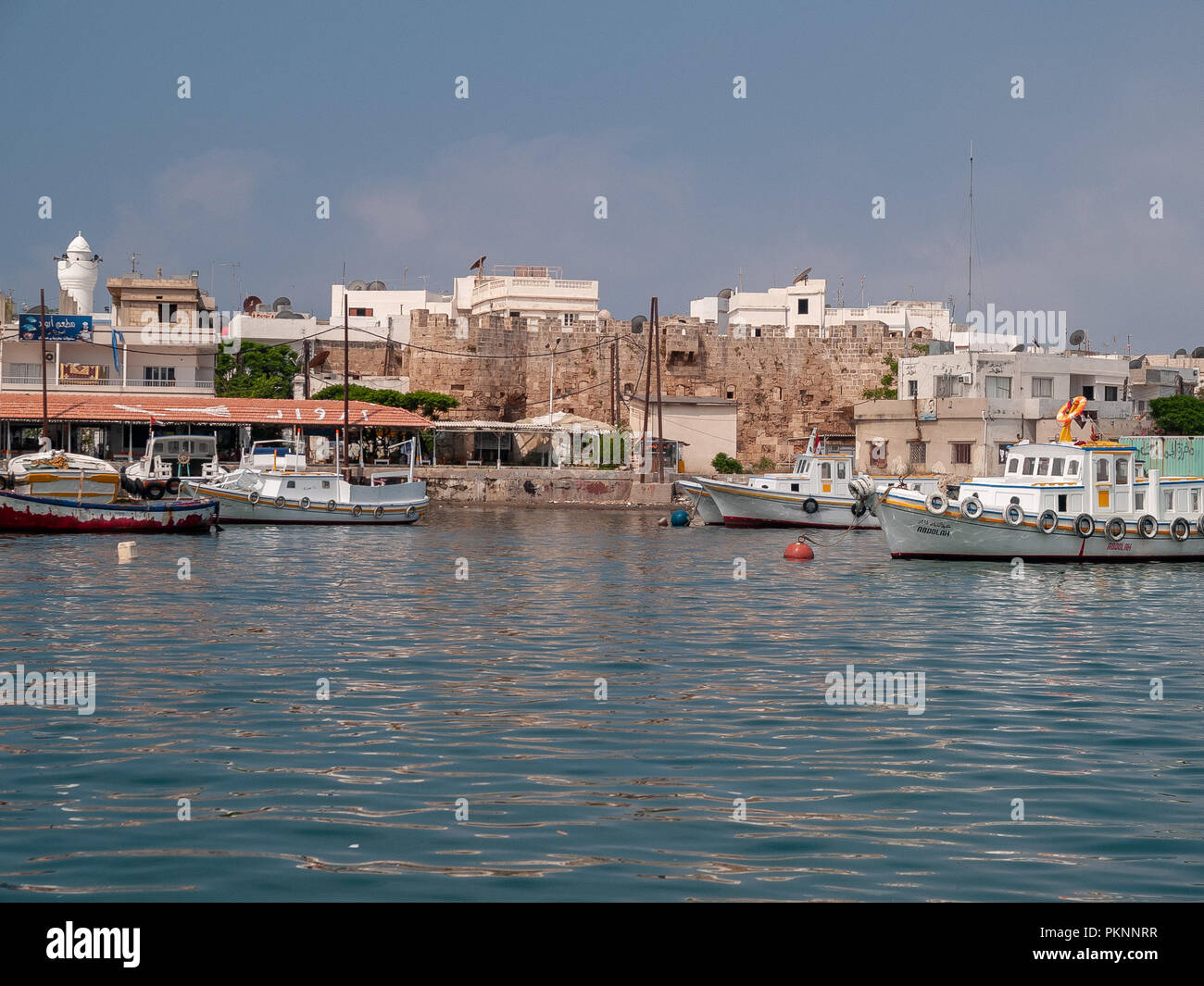 Arwad (Arados) is the only inhabited island in Syria. It is located in the Mediterranean Sea 3 km from Tartus. The town covers the entire island. Stock Photo