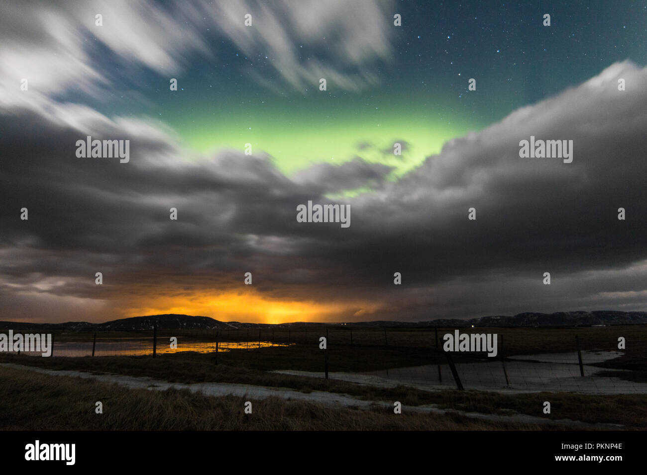 Northern Lights / Aurora Borealis hiding behind clouds Stock Photo - Alamy