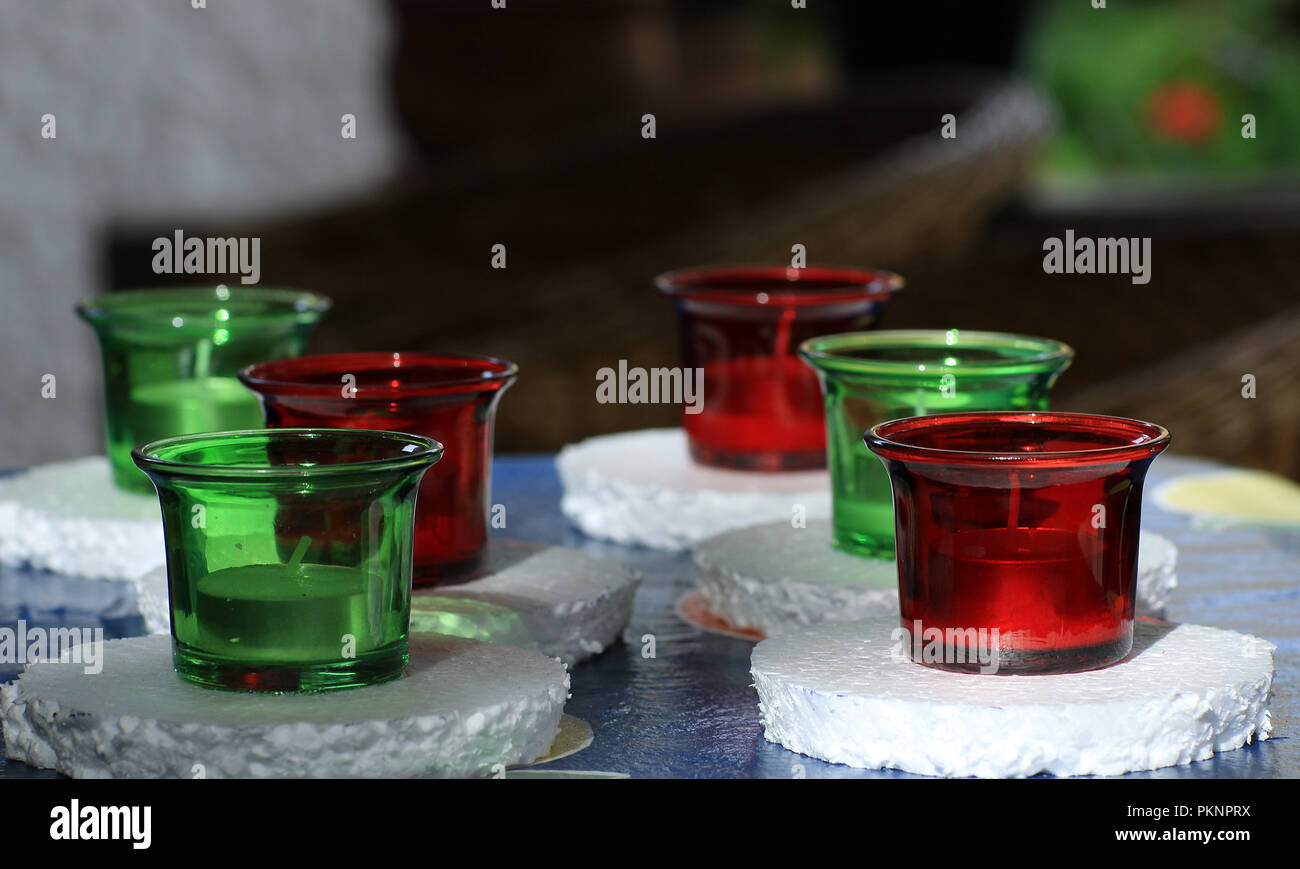 Red and green candles pool Stock Photo Alamy