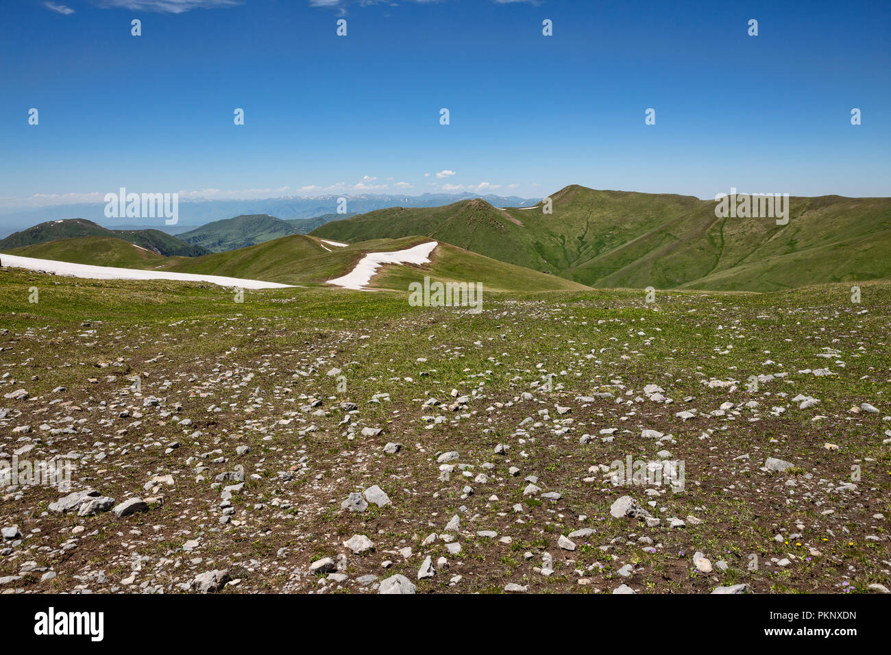 Foothills of Terskey Ala-Too mountain range as seen from Anvar Pass, Keskenkyia Loop trek, Jyrgalan, Kyrgyzstan Stock Photo