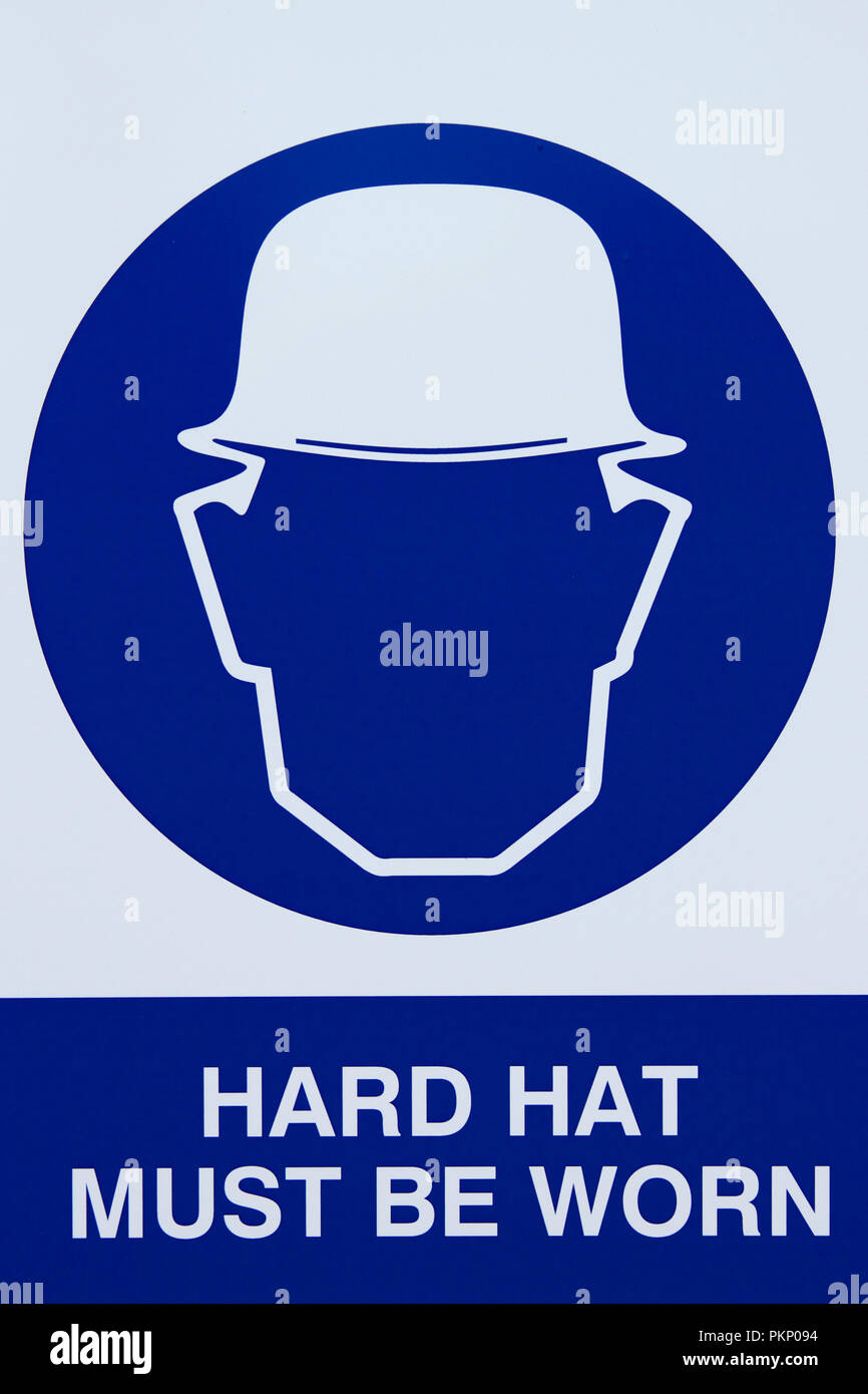 Hard hat must be worn signage at a building site. Stock Photo