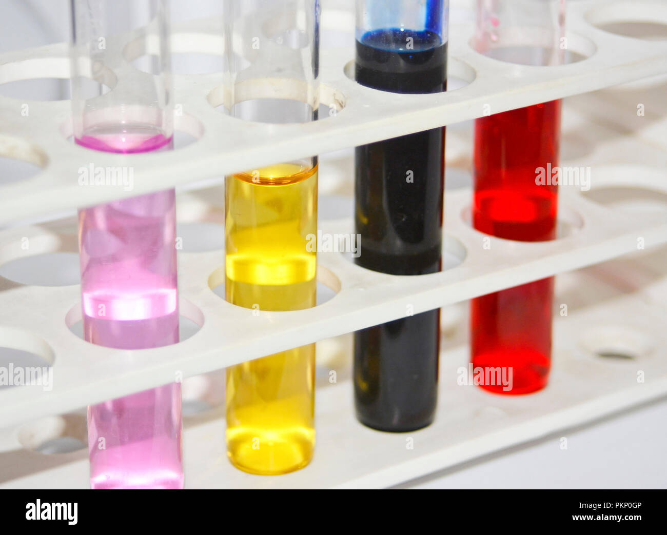Color test tube in stand Stock Photo - Alamy