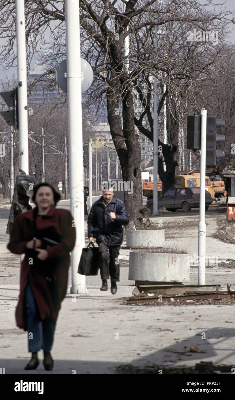 15th March 1993 During the siege of Sarajevo a woman and a man run