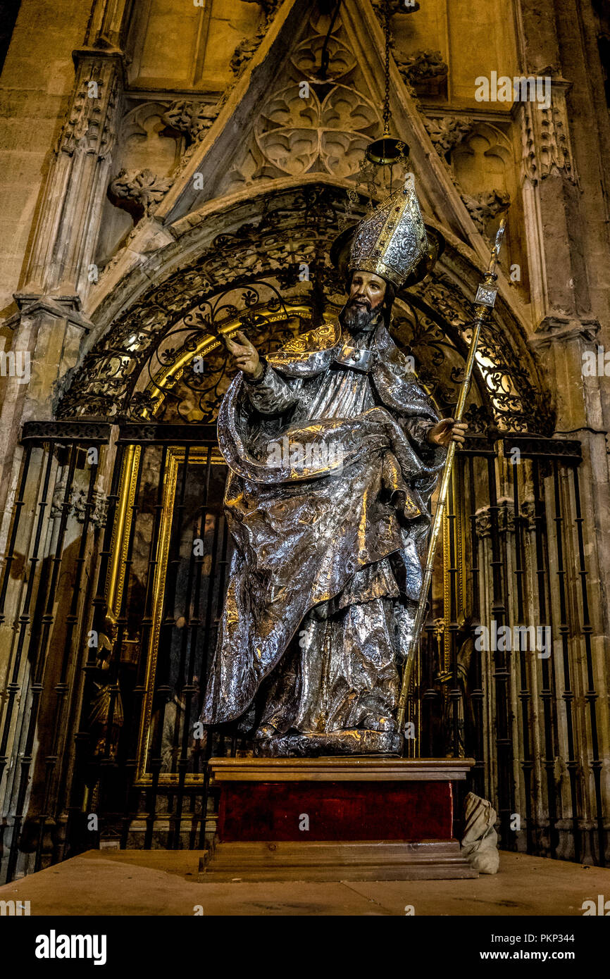 Seville, Spain- June 18, 2017: A statue of a saint inside the  Gothic cathedral in Seville, Spain June 2017, Europe Stock Photo