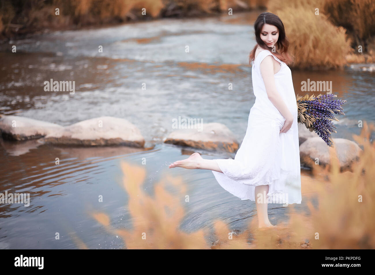 Pregnant woman in nature for a walk in the autumn Stock Photo - Alamy