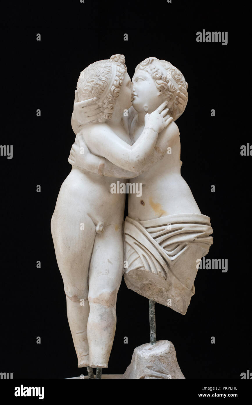 Rome. Italy. Sculpture of Cupid embracing Psyche (4th century A.D), . Museo Archeologico Ostiense, Ostia Antica. From the Domus of Cupid and Psyche (1 Stock Photo