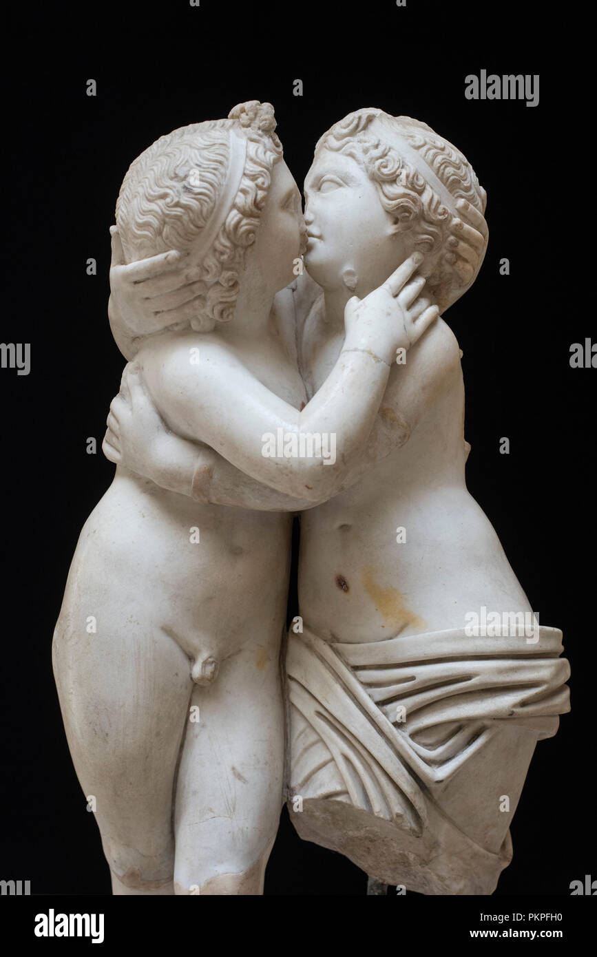 Rome. Italy. Sculpture of Cupid embracing Psyche (4th century A.D), . Museo Archeologico Ostiense, Ostia Antica. From the Domus of Cupid and Psyche (1 Stock Photo