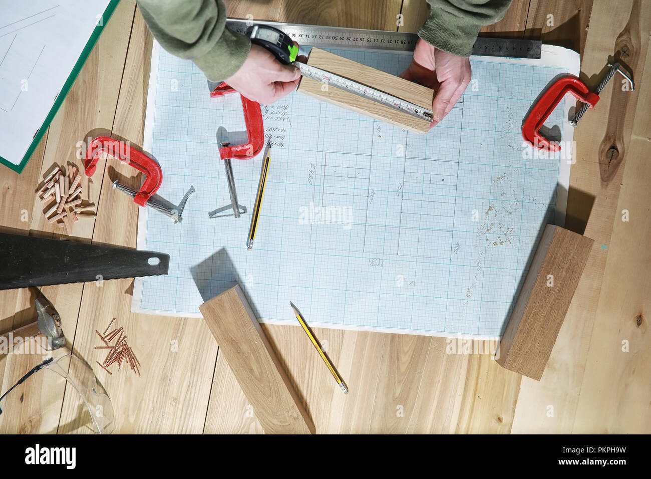 Workshop with tools and electric saws in the process Stock Photo