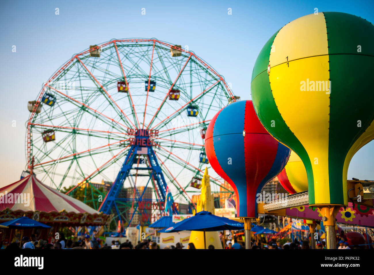 NEW YORK CITY - AUGUST 17, 2017: View from the Coney Island boardwalk of the iconic amusement park Wonder Wheel. Stock Photo