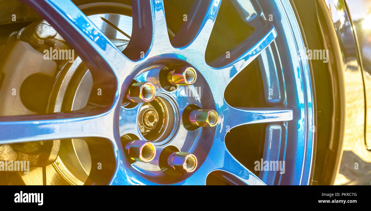 Blue Square Rim Polished blue rim of a black car Stock Photo - Alamy