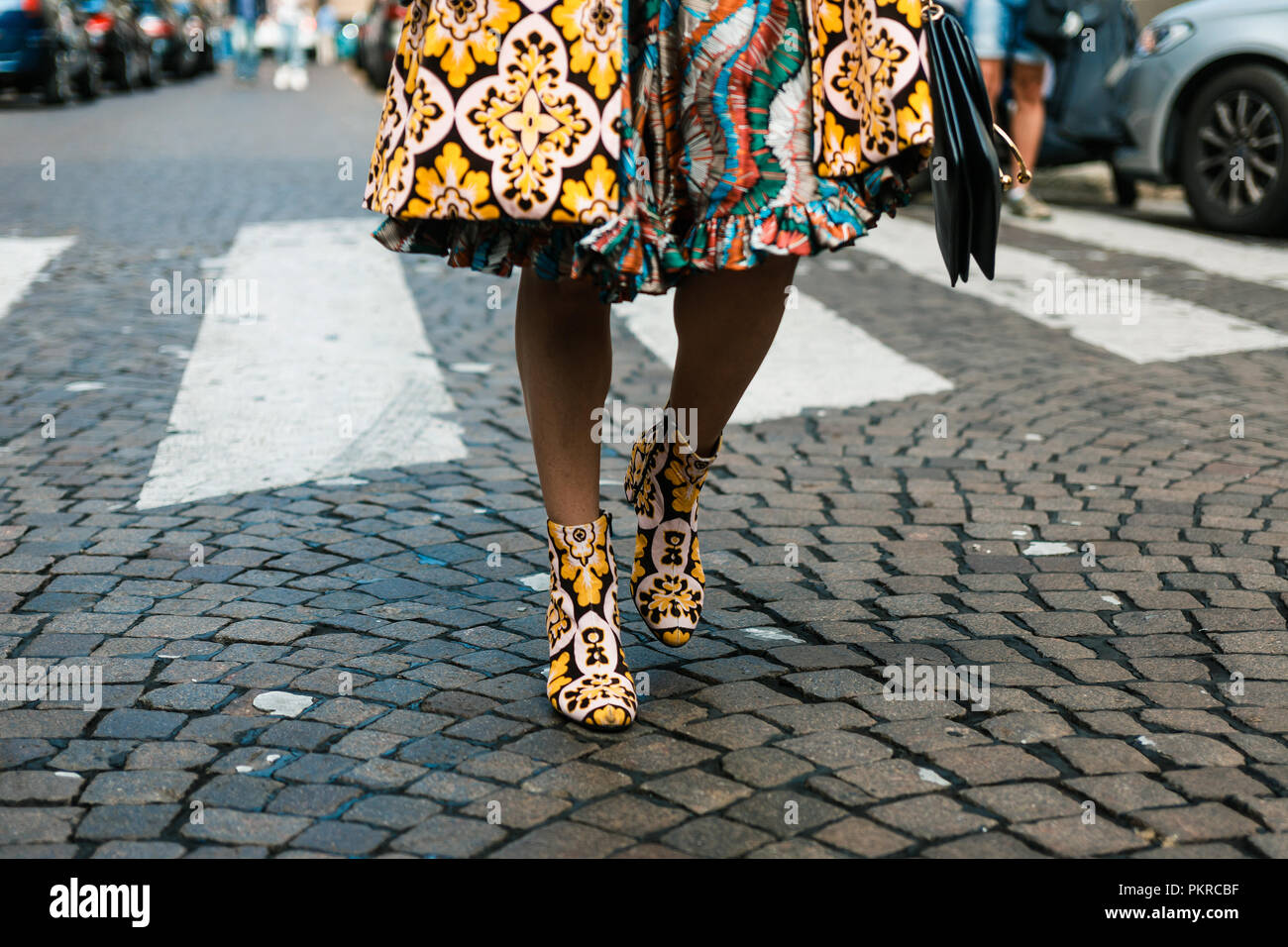MILAN - SEPTEMBER 23: Man with Louis Vuitton backpack and shirt with flames  before Antonio Marras fashion show, Milan Fashion Week street style on Sep  Stock Photo - Alamy