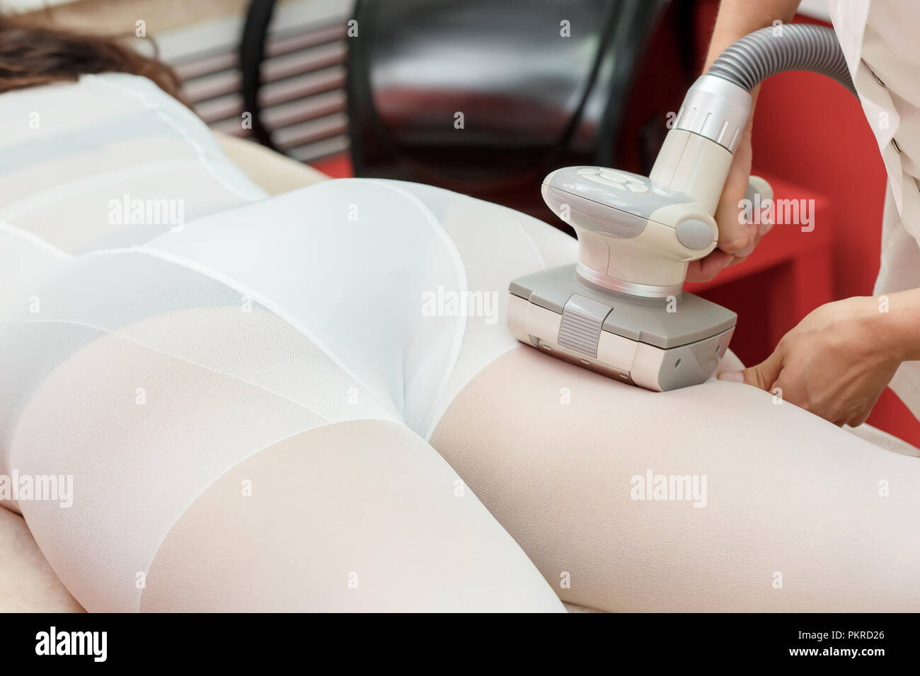 Lymphatic drainage massage LPG or R-sleek apparatus process. Woman in white  suit getting anti cellulite massage in a beauty salon. Skin and body care  Stock Photo - Alamy