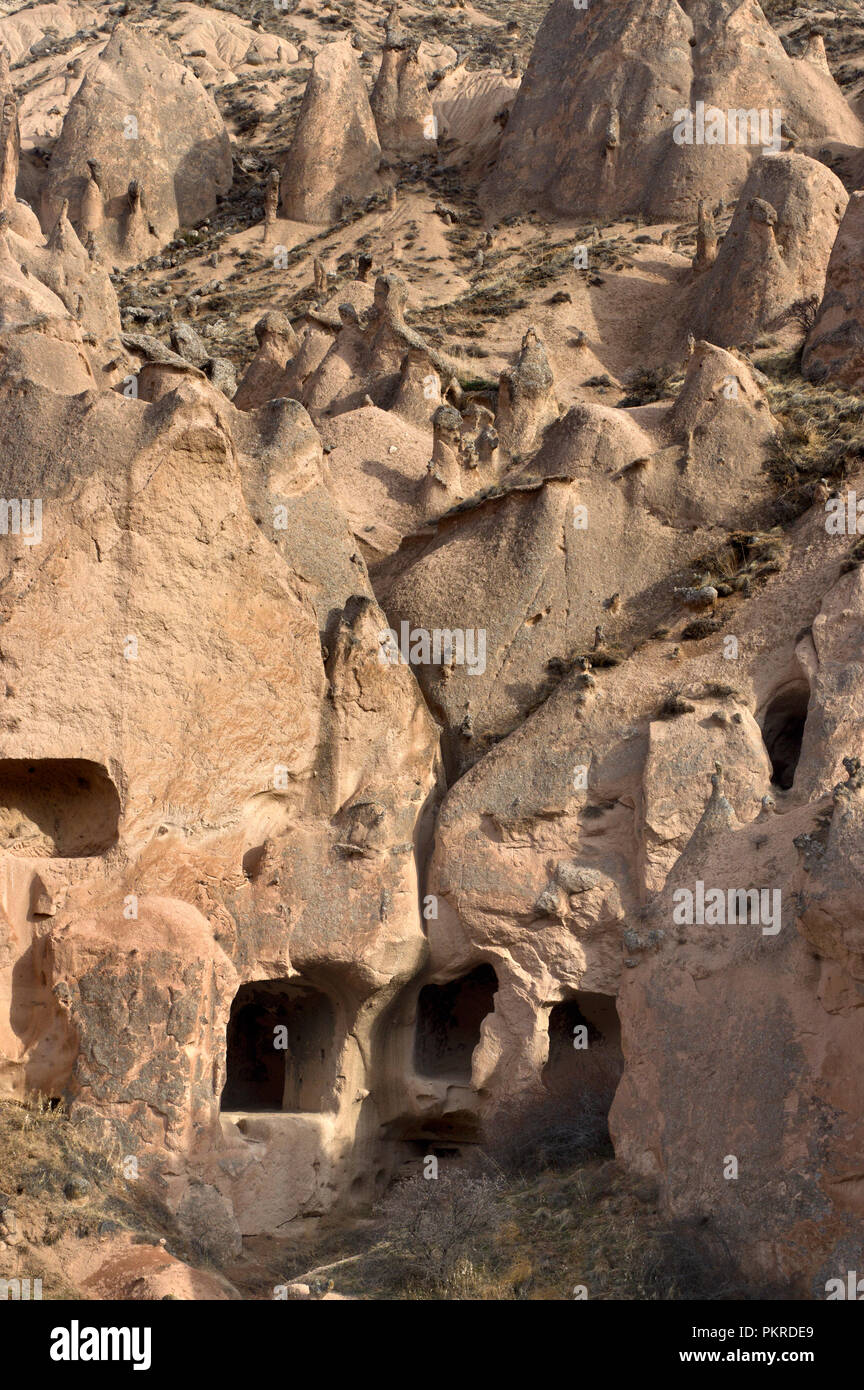 Houses and Christian religious rooms built into the cliffs in Zelve Open Air Museum in Cappadocia, Turkey Stock Photo