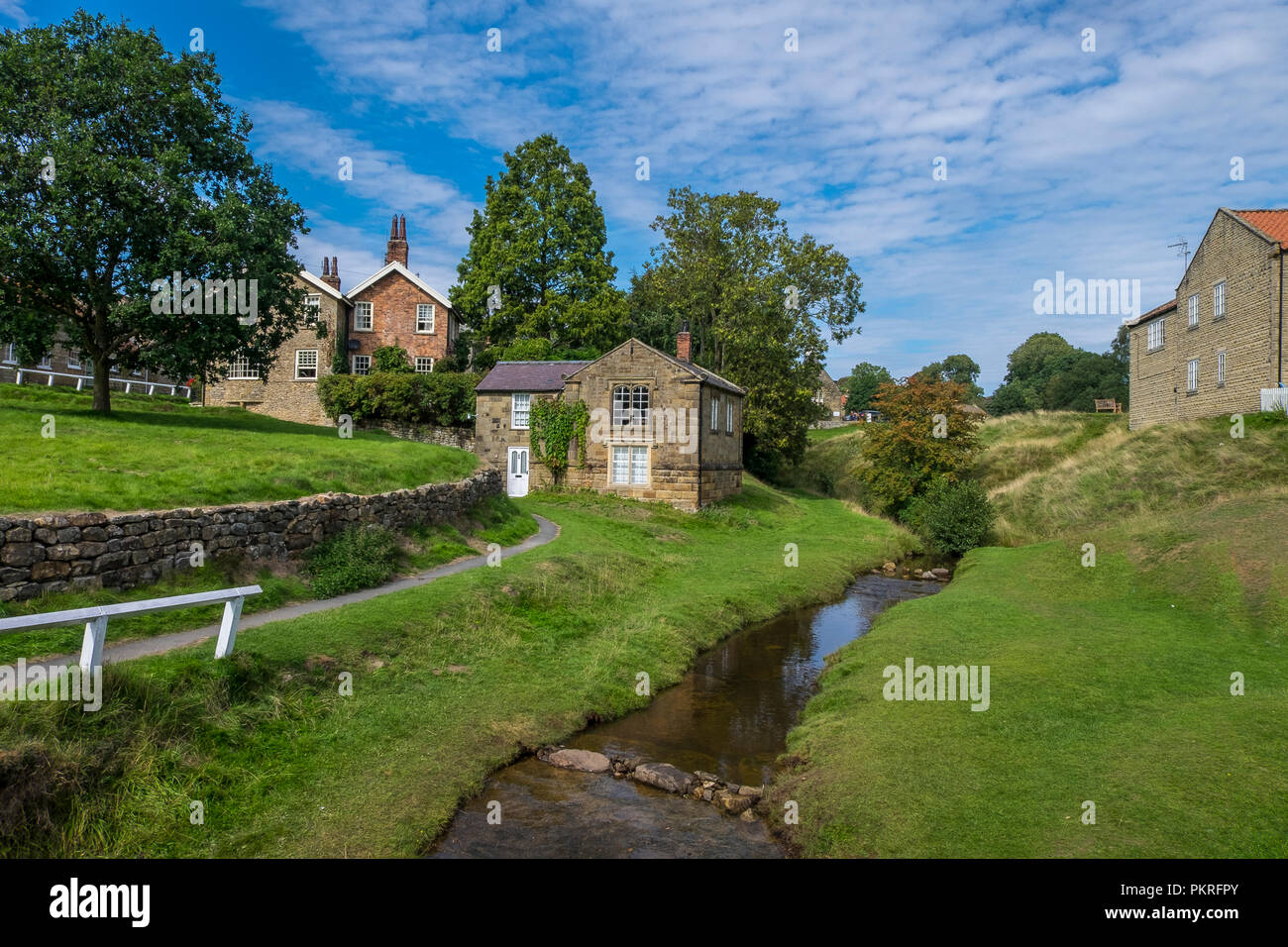 quaint chocolatebox cottage by a stream in hutton le hole, north