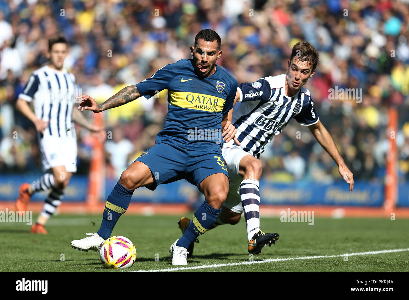BUENOS AIRES, ARGENTINA - AUGUST 2018: Carlos Tevez (Boca Juniors) fights the ball against el Chapo (Talleres de Cordoba) on the first match for the s Stock Photo