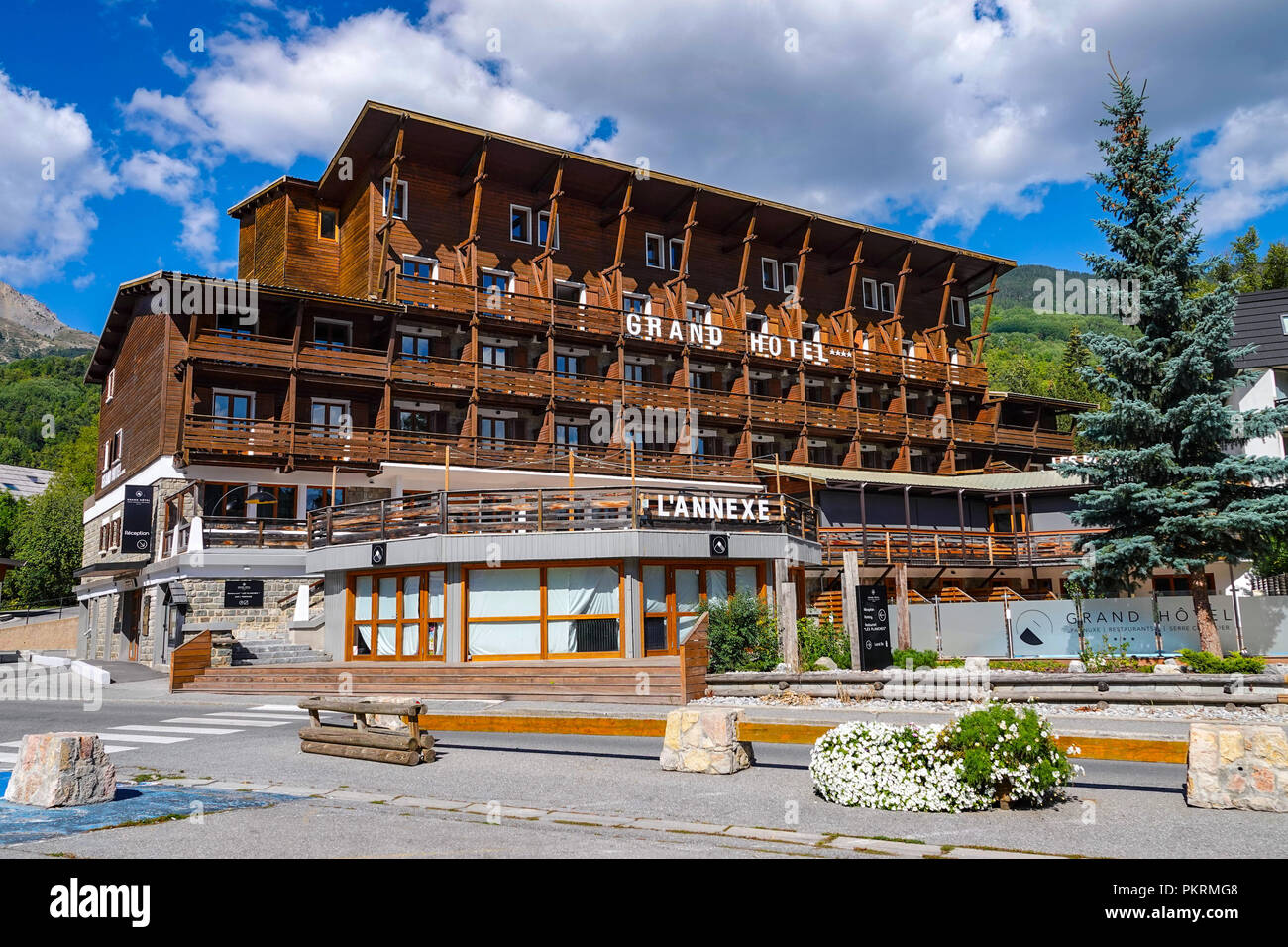 Wooden Grand Hotel, Chantemerle, Serre Chevalier ski resort, out of season, Briancon, France Stock Photo