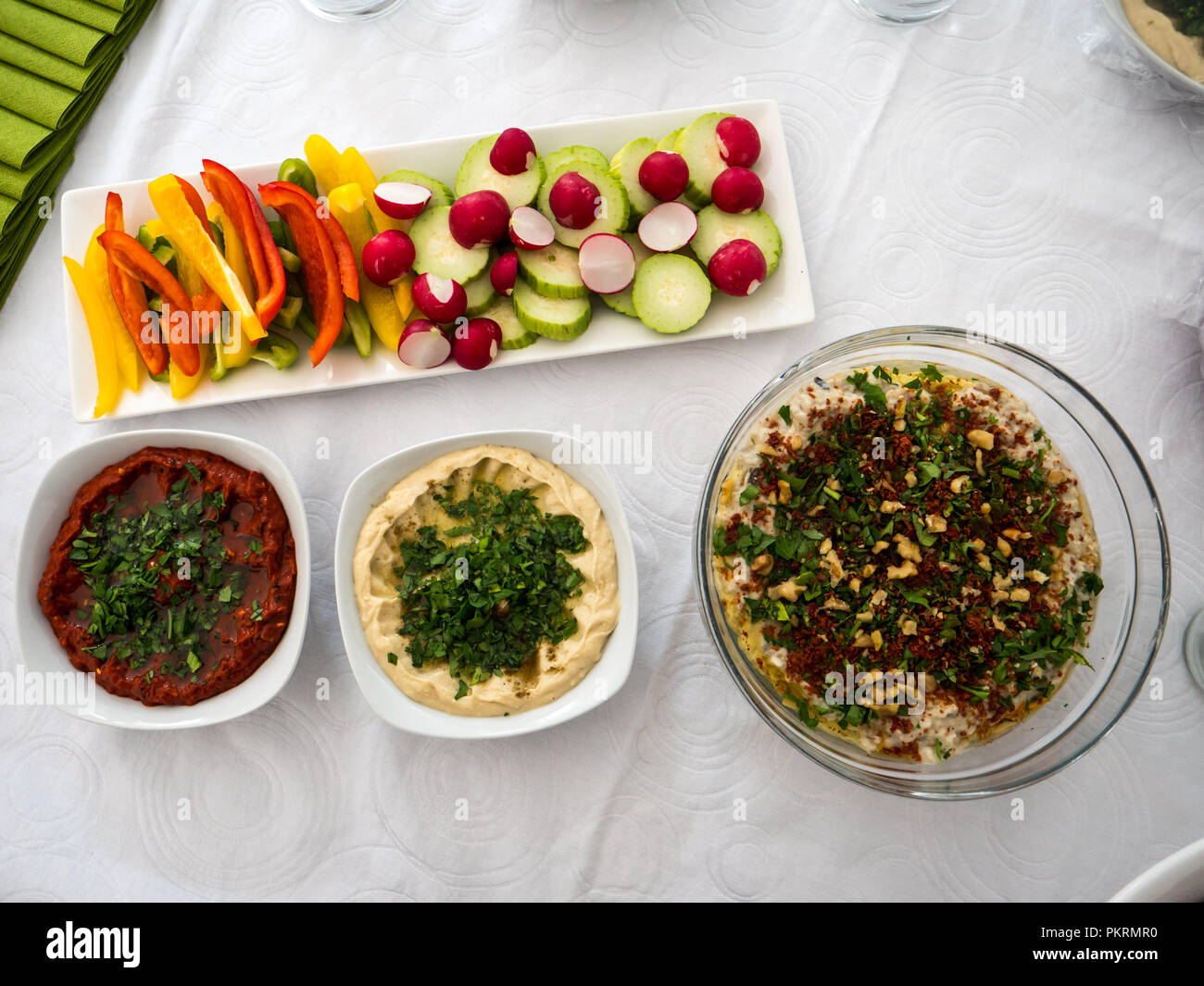 A mix of arabic food together with fresh vegetables Stock Photo