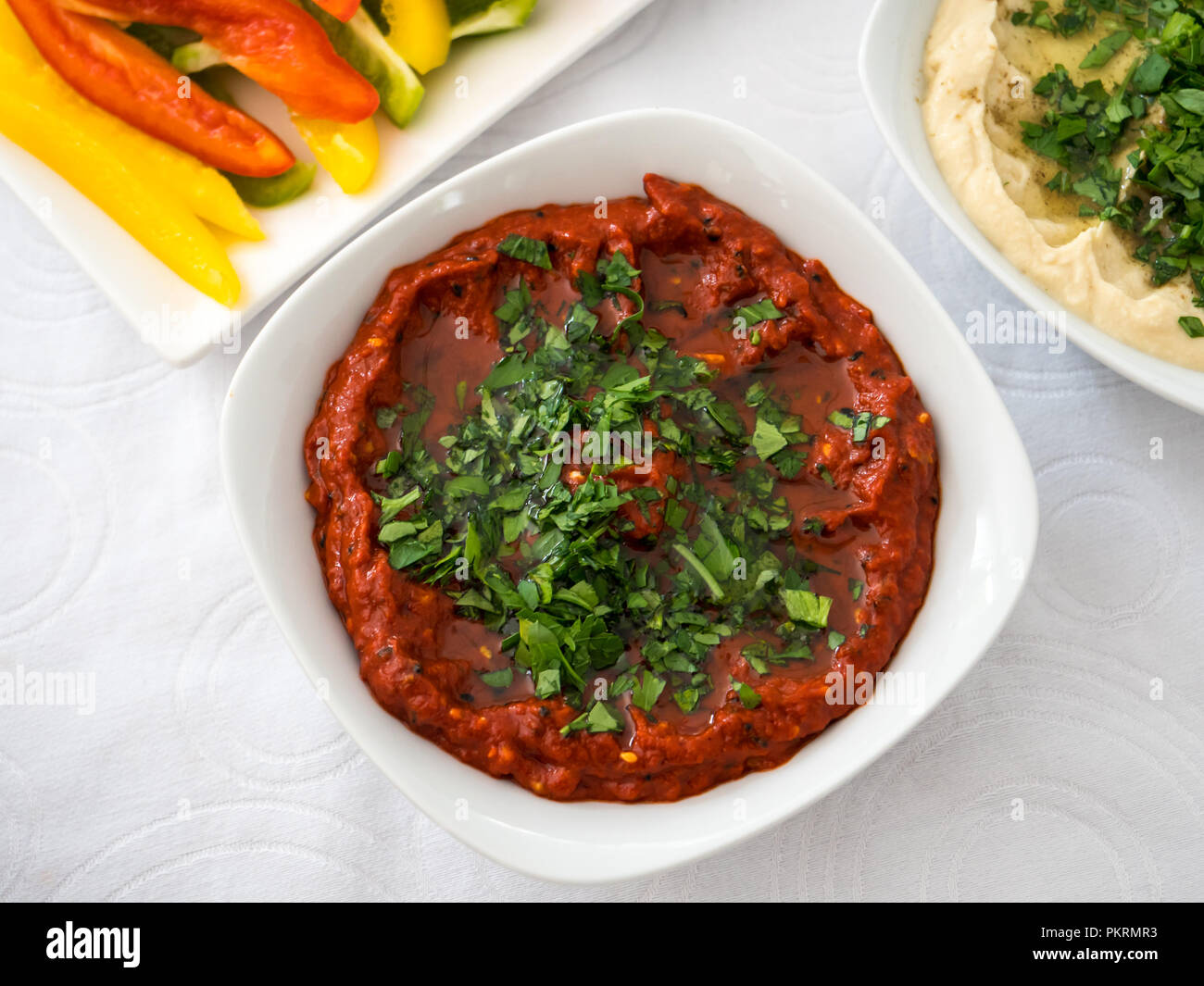 Close up of a plate with a spicy chickpea cream, a famous arabic food Stock Photo
