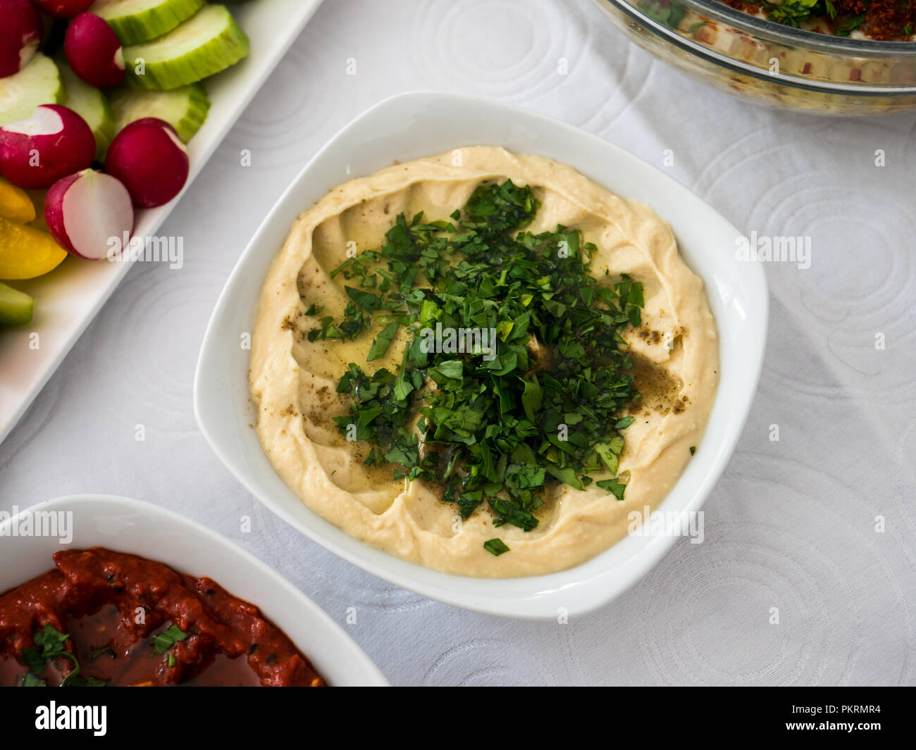 A plate of hummus, a famous arabic food made of chickpea Stock Photo