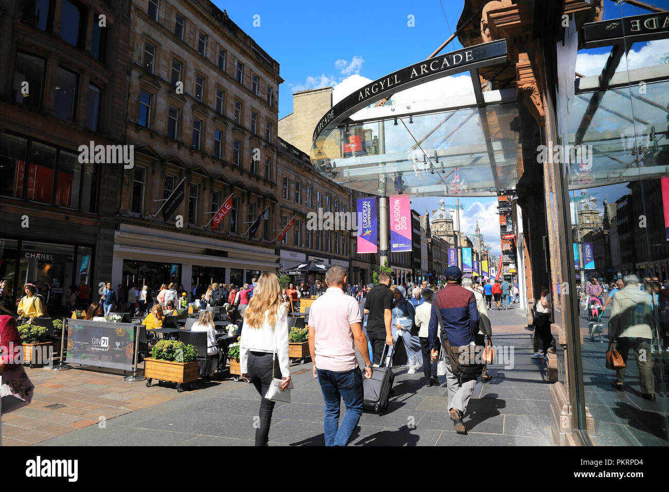 The entrance to the Argyll Arcade on busy main thoroughfare Buchanan Street, in Glasgow city centre, in Scotland, UK Stock Photo