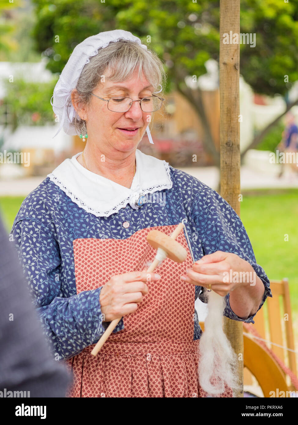 San Diego, AUG 2: People costume in ancient style weaving in the historical old town on AUG 2, 2014 at San Diego, California Stock Photo