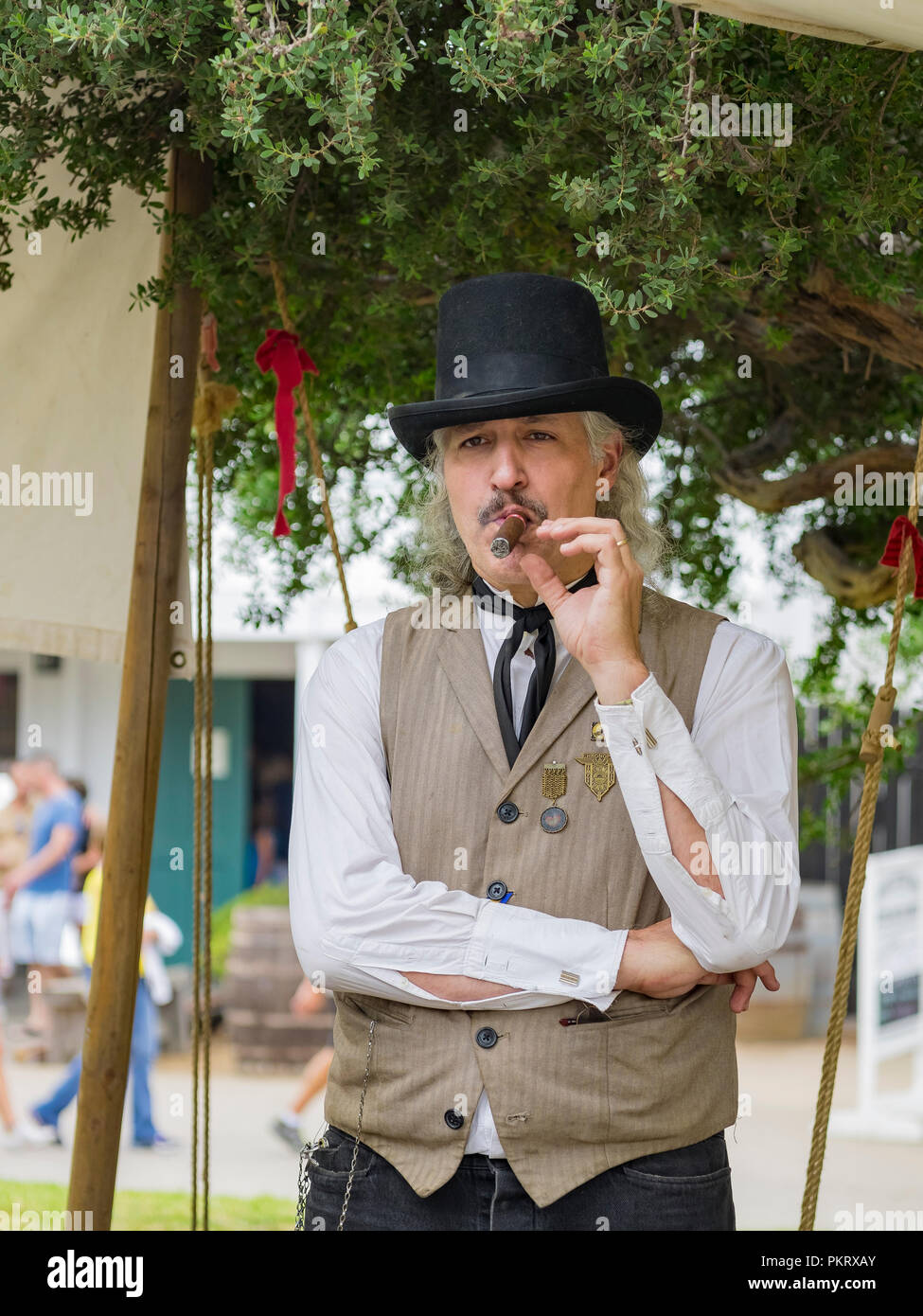 San Diego, AUG 2: People costume in ancient style smoking tobacco in the historical old town on AUG 2, 2014 at San Diego, California Stock Photo
