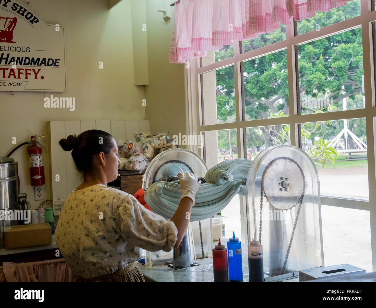 San Diego, AUG 2: People costume in ancient style making candy in the historical old town on AUG 2, 2014 at San Diego, California Stock Photo