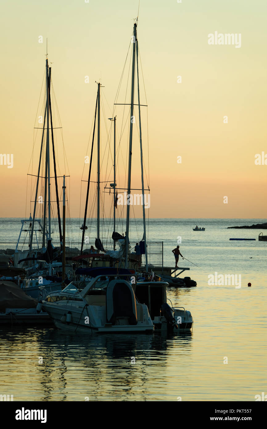 Boats at Marina in Adriatic Sea in Pula, Croatia. At sunset Stock Photo